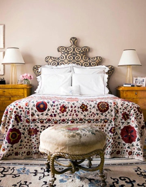Choose an Ornate Headboard with Swirling Pattern for Drama
