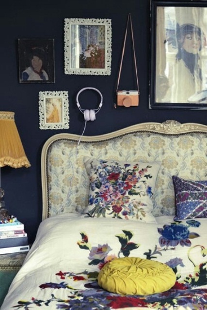 Framed Gallery Wall Adds Personal Touches Above Bed
