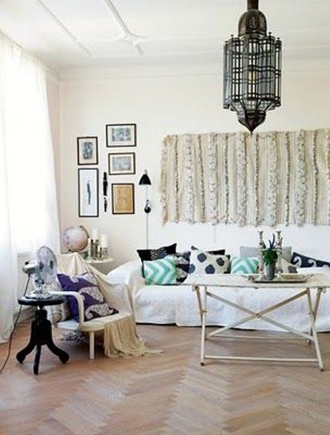 Textured Wall Hanging Adds Depth Above Sofa