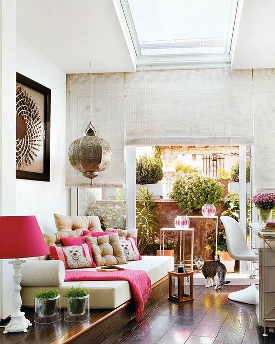 Introduce Greenery with Glass Planters on a Low Daybed
