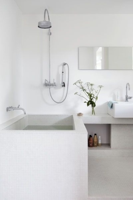 White Mosaic Tiled Bathtub Creates a Zen-Like Soaking Experience