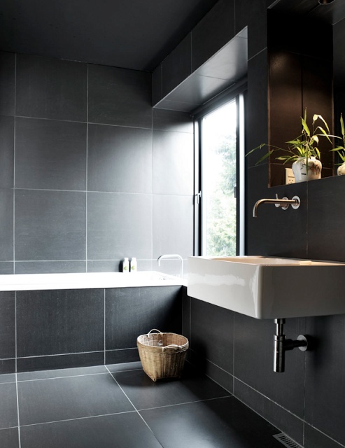 Woven Basket Adds Natural Texture Near The Tub