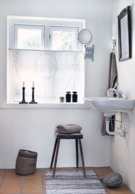 Black Candlesticks Add Dramatic Flair To The Windowsill