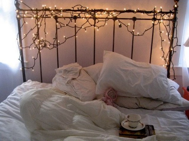 Drape String Lights Over a Metal Headboard