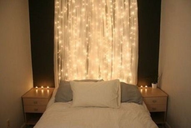 Sheer White Drapes with Fairy Lights for a Soft Headboard Glow