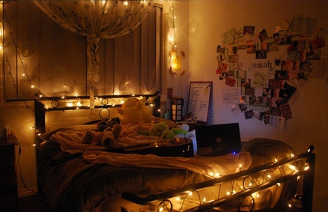 Wrap Your Bed Frame with String Lights for a Cozy Glow