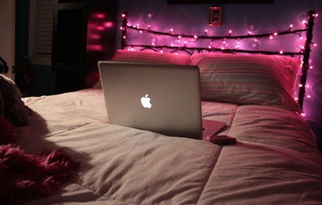 Wrap Pink String Lights Across the Metal Headboard
