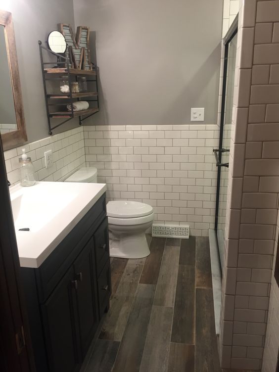 Tiered Metal Shelf Adds Open Storage Above the Toilet