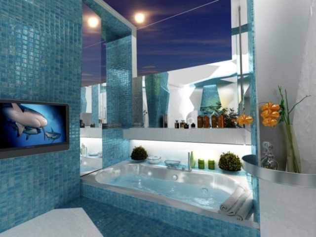 Wall-Mounted TV Adds Entertainment Above Blue Mosaics