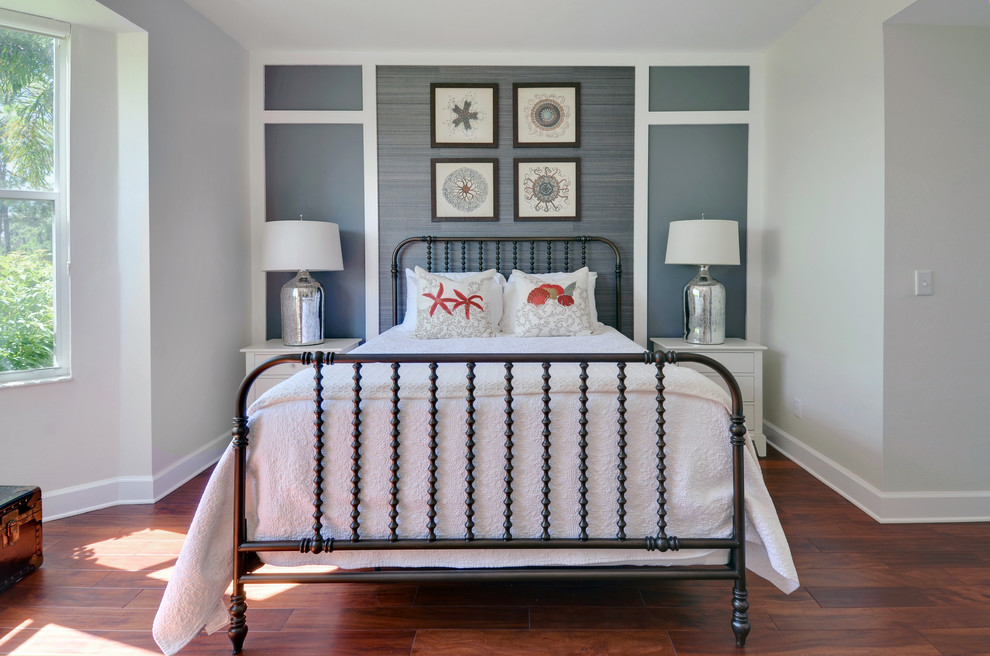 Four Framed Circular Art Pieces Add Graphic Interest Above the Bed