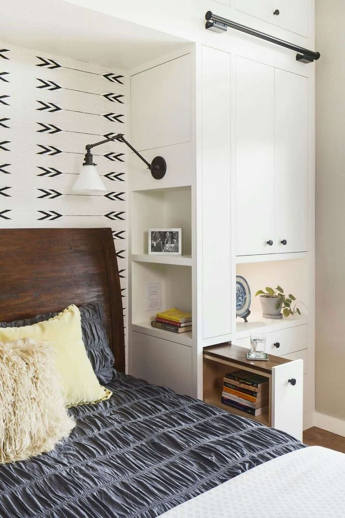 Pull-Out Shelf With Books Creates a Hidden Nightstand