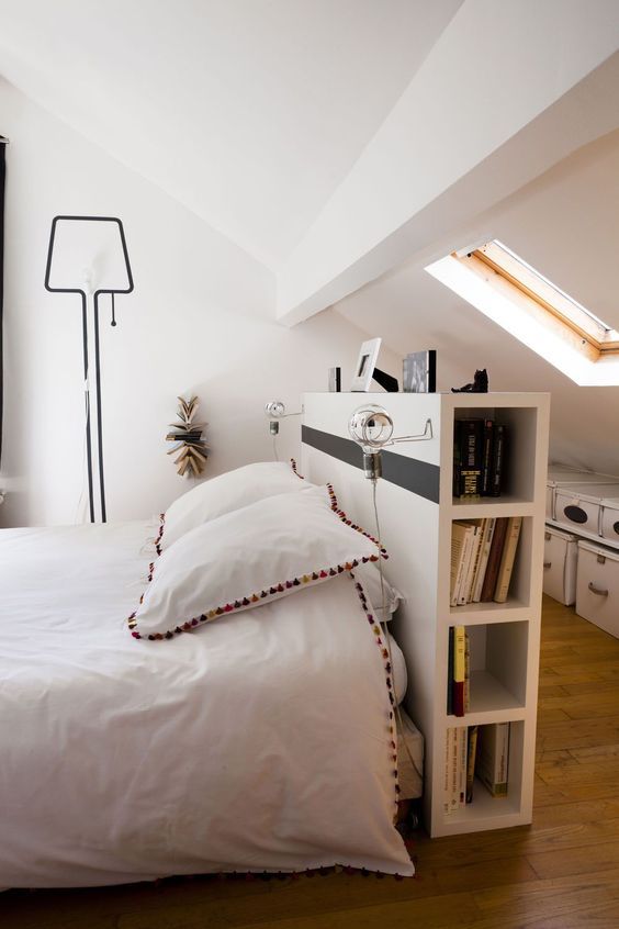 White Cube Shelving Unit Acts as a Bedside Table