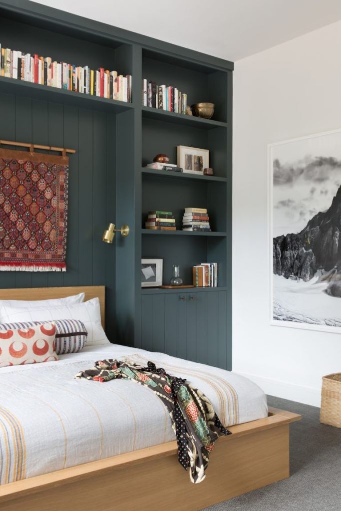 Dark Teal Built-ins Frame Your Bed With Open and Closed Storage