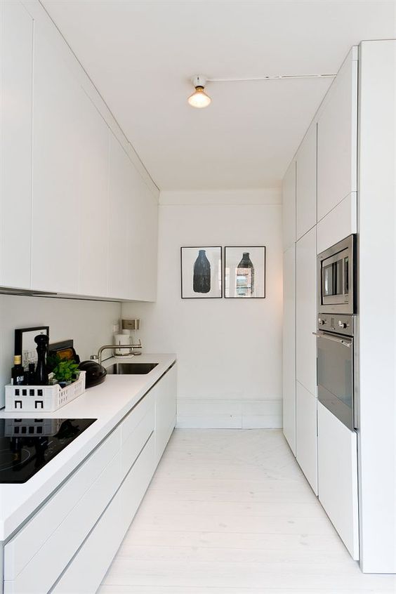 White Crate Organizes Spices and Utensils Near Stove