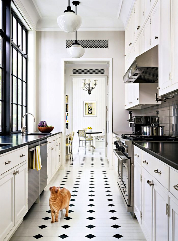 Black Diamond Floor Tiles Add Graphic Contrast to White Kitchen