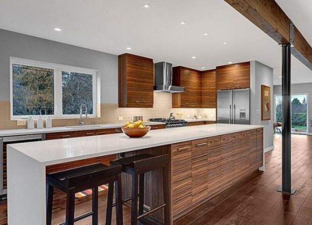 Soften a Sleek Island with Wood Grain Cabinetry
