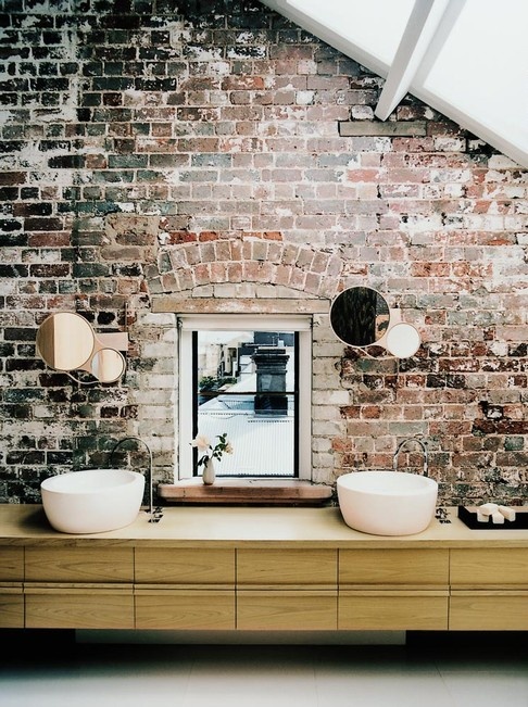 Round Mirrors Mounted on Wood Backings Add Asymmetrical Interest