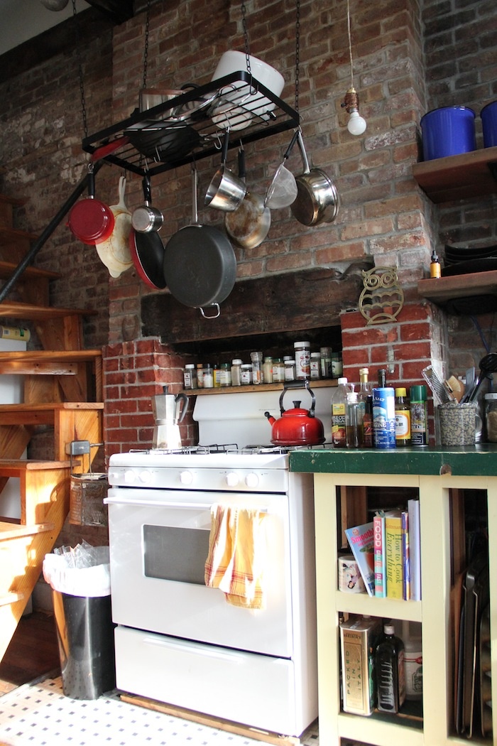 Hanging Pot Rack Creates Vertical Kitchen Storage