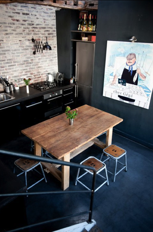 Anchor Your Casual Seating Area with a Rustic Wooden Table