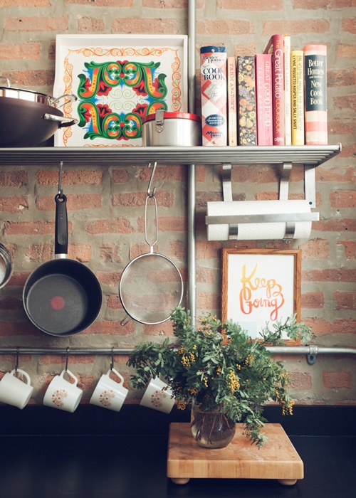 Decorative Tray Adds Color Above Kitchen Shelf