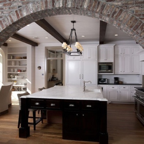 Anchor Your Kitchen Space with a Dark Wood Island and Marble Top