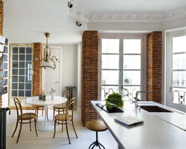 Frame Large Windows with Exposed Brick Pillars