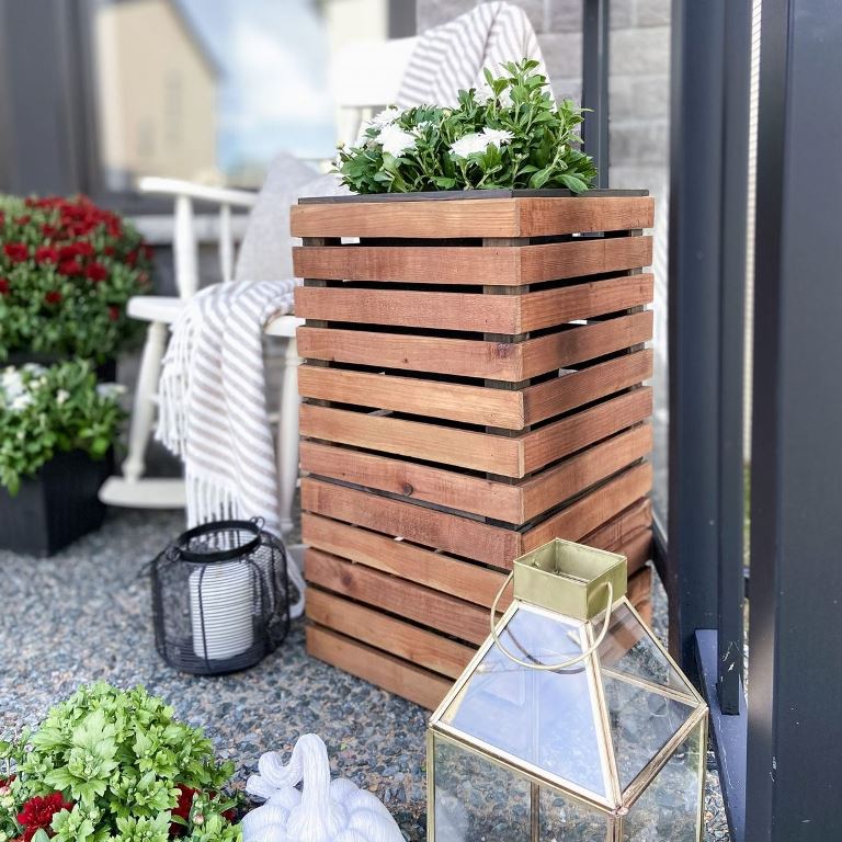 Tall Wooden Planter With Horizontal Slats Adds Warmth