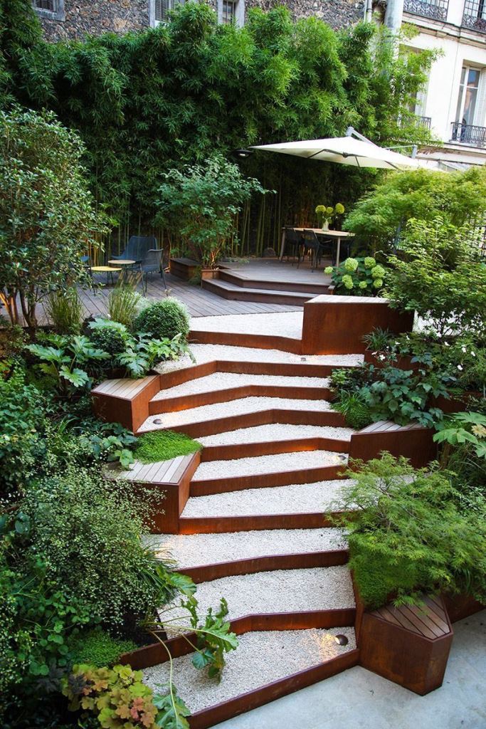 Rusted Metal Steps With Integrated Wooden Seating Areas