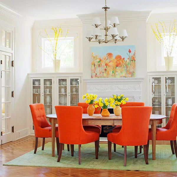 Bold Statement with Orange Upholstered Chairs Around the Table