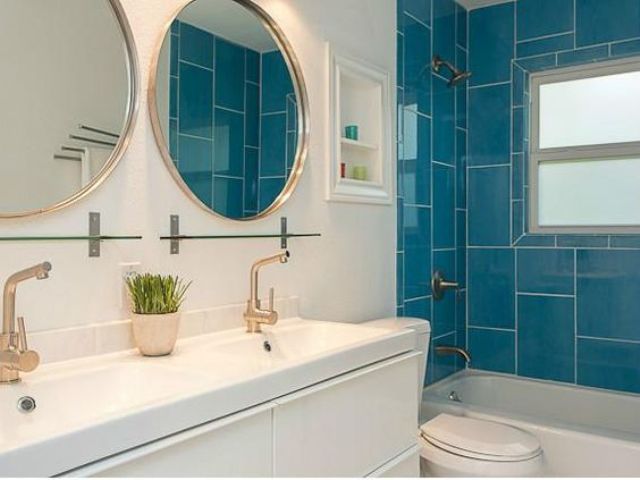 Dual Sinks With Rose Gold Faucets Add Glamour