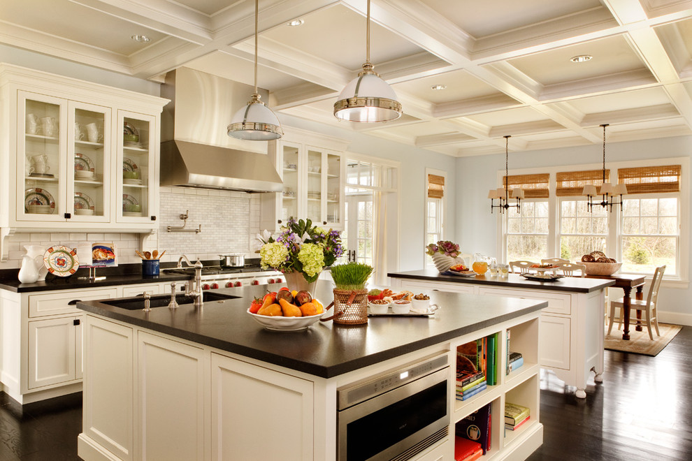 White Kitchen Island with Built-In Microwave and Bookshelves