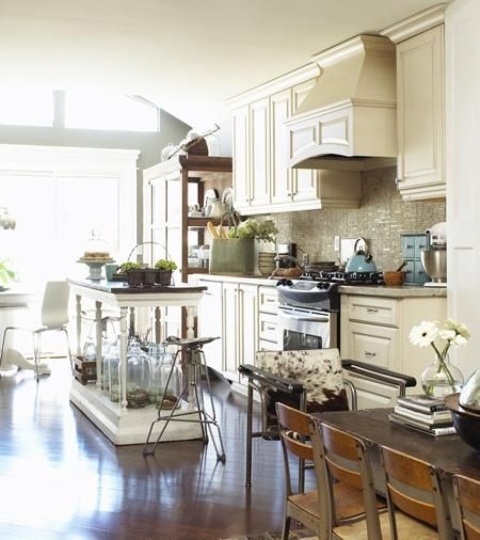 Glass Jugs Displayed on a White Kitchen Island Base