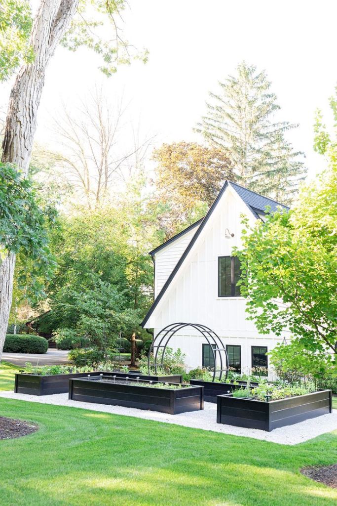 Staggered Black Raised Beds on Gravel