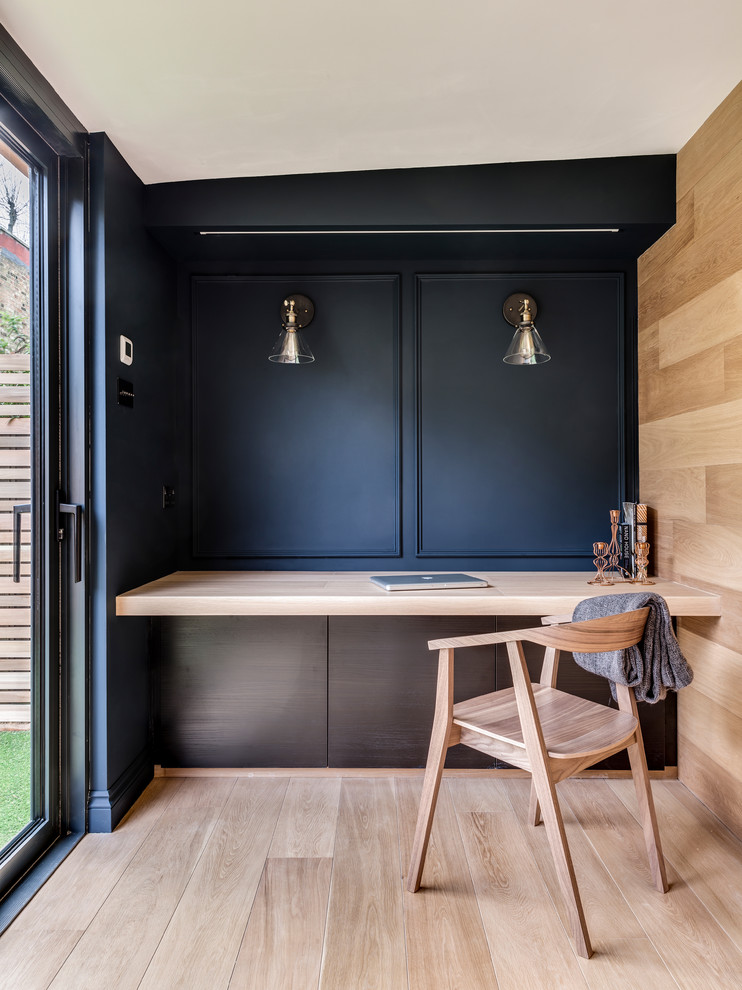 Dark Cabinets Anchor a Floating Wood Desk